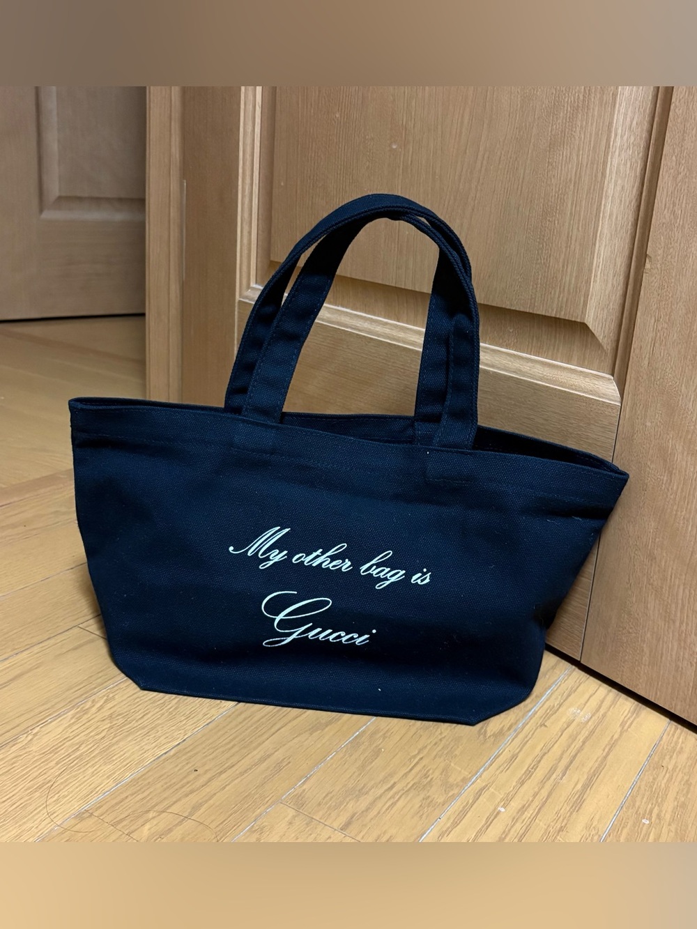 Brand new with No tag. Black Canvas Tote Bag with Script Logo.My Other Bag.